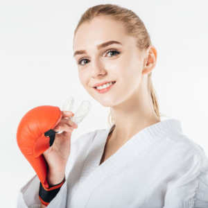 Sportlerin mit Schiene in der Hand - Foto: LightField Studios - shutterstock.com